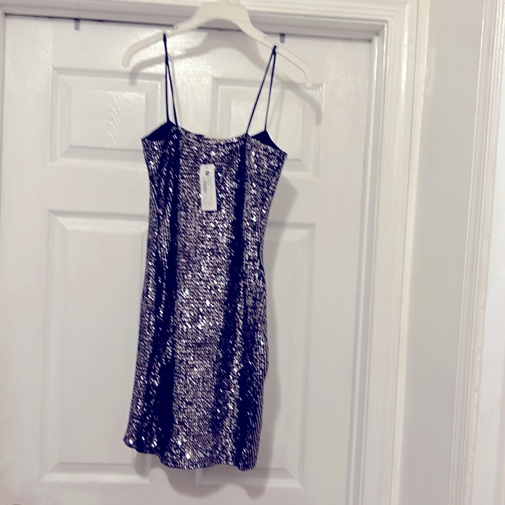 NWT Blk with  silver sequins size M by Olive tree was $33.99 now for $18